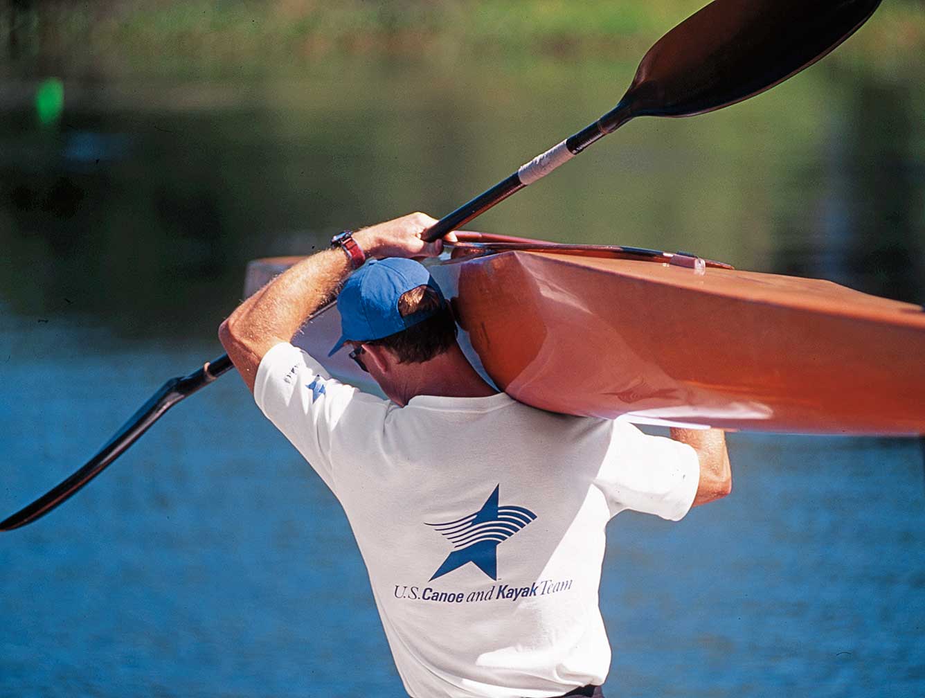 us-canoe-and-kayak-team_rower-carrying.jpg Art Direction by: Bart Crosby, Crosby Associates
